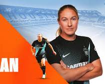 Delanie Sheehan in action for the Houston Dash, highlighting her role as a key midfielder before the transfer to Denver